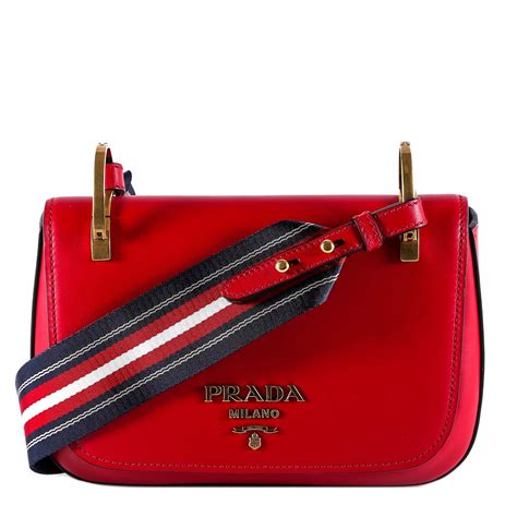 prada bag with colorful strap.